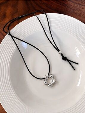 Black Leather Cord Necklace with Silver Flower Pendant